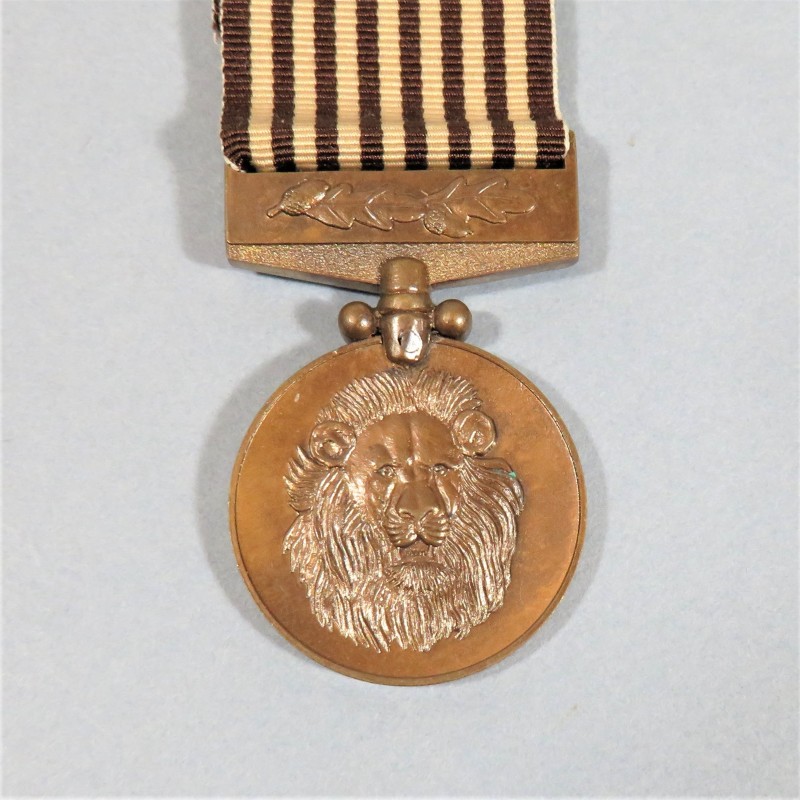 ZIMBABWE MEDAILLE DU MERITE POUR L'ARMEE COMMENDATION MEDAL FOR THE ARMY MARQUEE SUR LA TRANCHE SPECIMEN 04 °