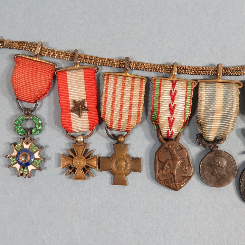 CHAINE OU BARRETTE DE 10 REDUCTIONS ANCIEN DE LA SECONDE GUERRE LEGION D'HONNEUR COLONIALE LA PAZ PALMES °