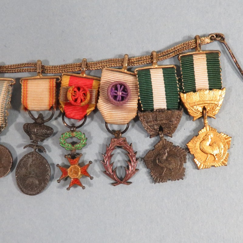 CHAINE OU BARRETTE DE 10 REDUCTIONS ANCIEN DE LA SECONDE GUERRE LEGION D'HONNEUR COLONIALE LA PAZ PALMES °