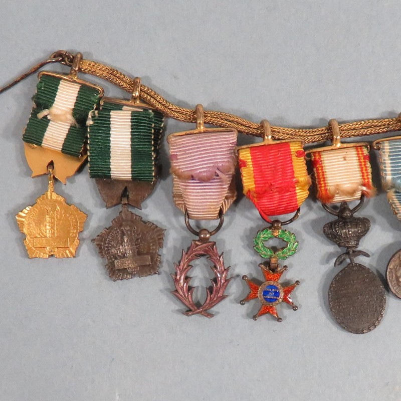 CHAINE OU BARRETTE DE 10 REDUCTIONS ANCIEN DE LA SECONDE GUERRE LEGION D'HONNEUR COLONIALE LA PAZ PALMES °